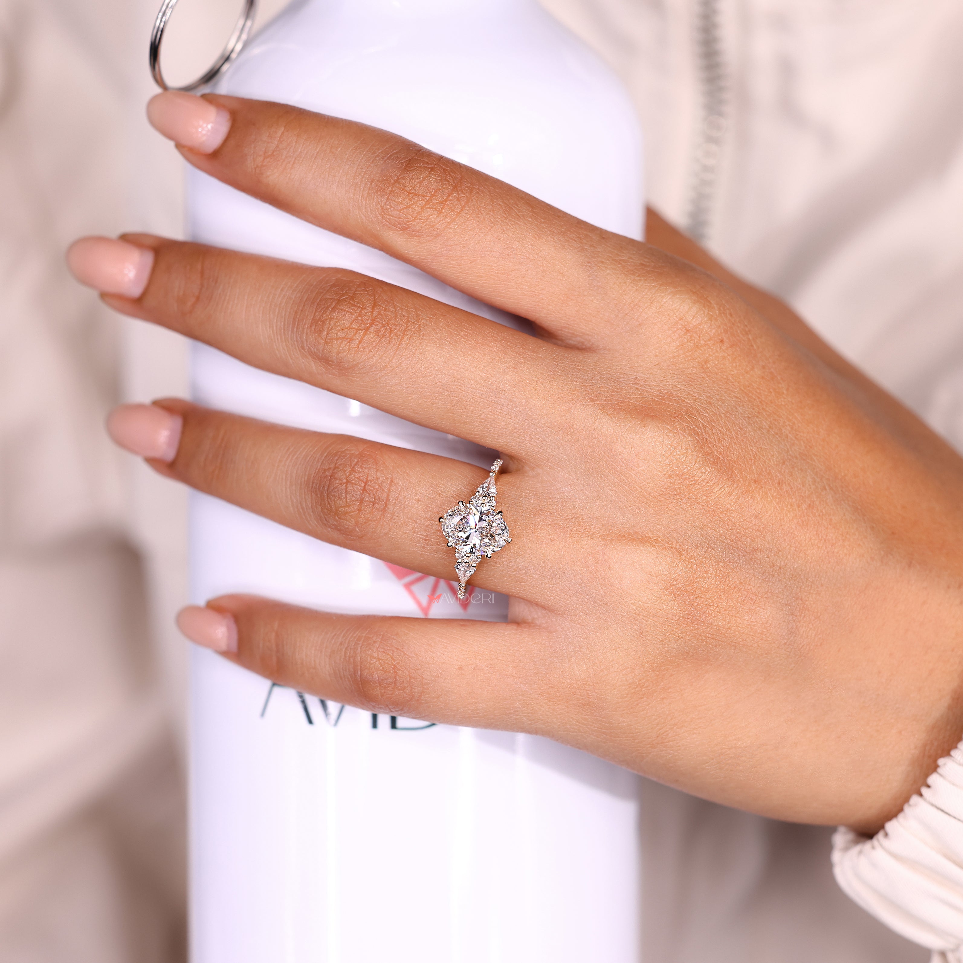 Lab grown oval diamond ring with muse setting design
