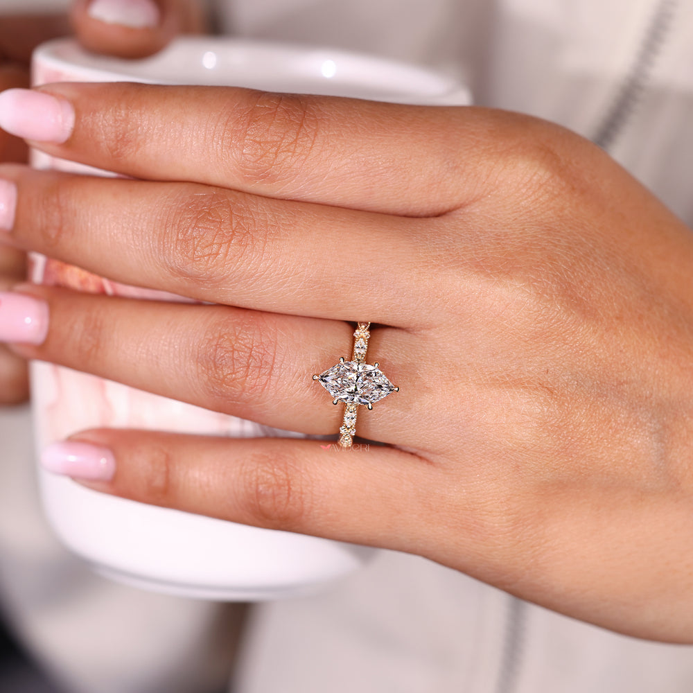 Vintage style dutch marquise diamond ring with milgrain.