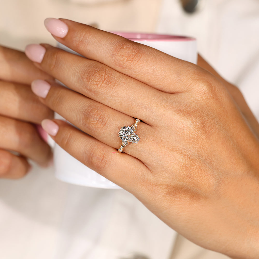 Handmade diamond ring with coffin cut and cathedral setting
