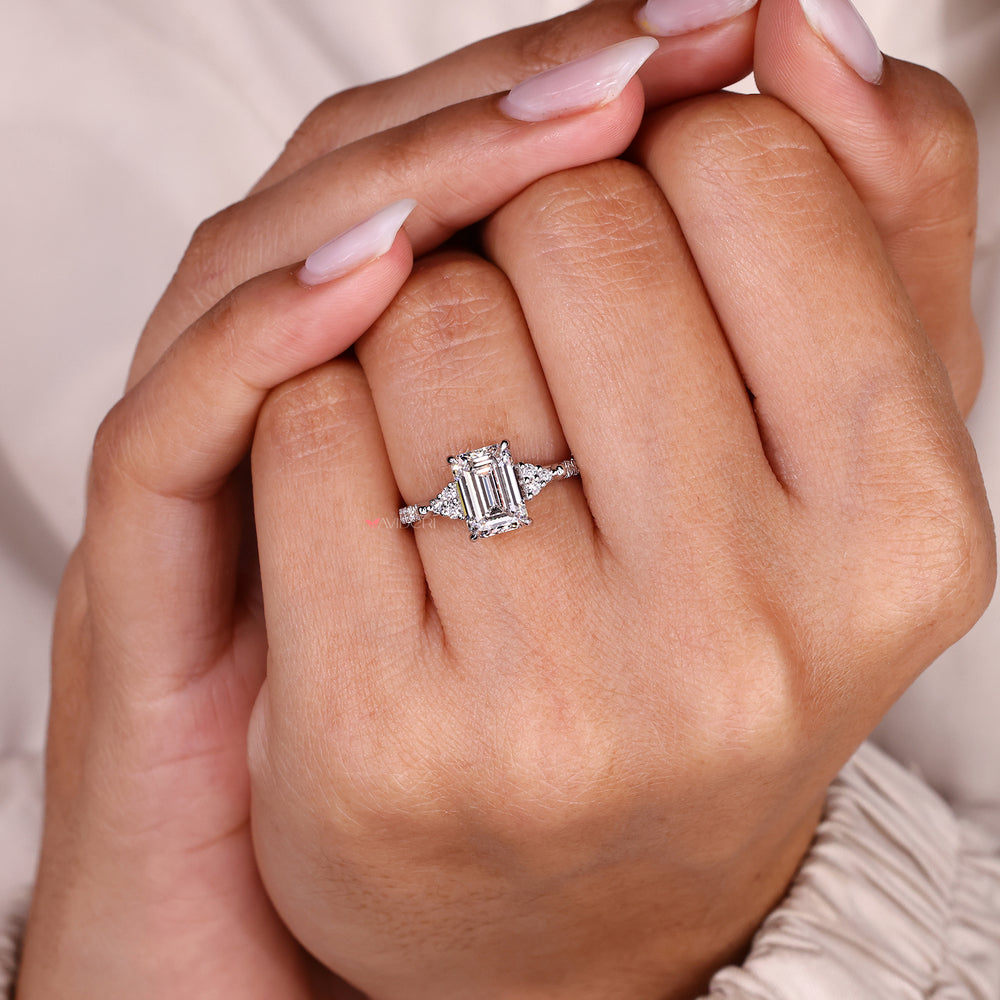 Lab grown emerald diamond ring with trellis setting.
