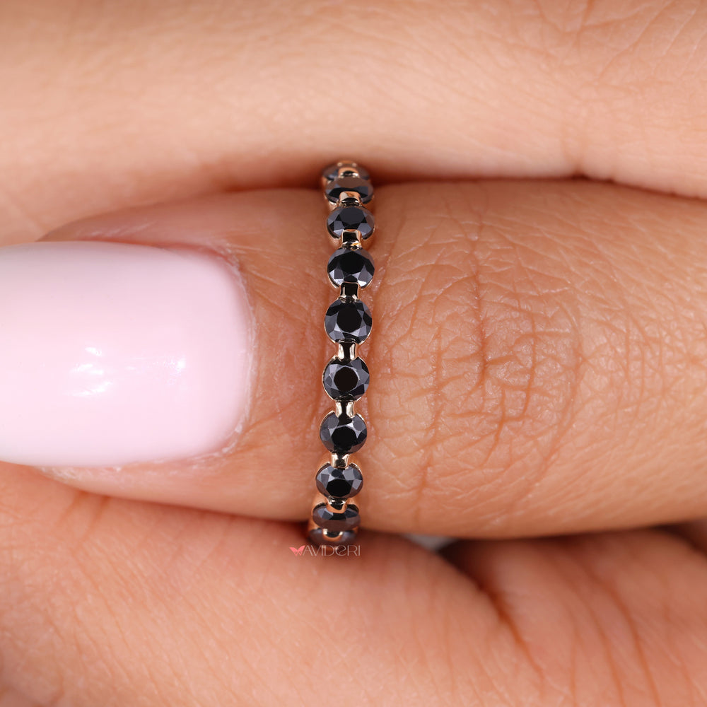 This round wedding band offers a timeless, symmetrical look.