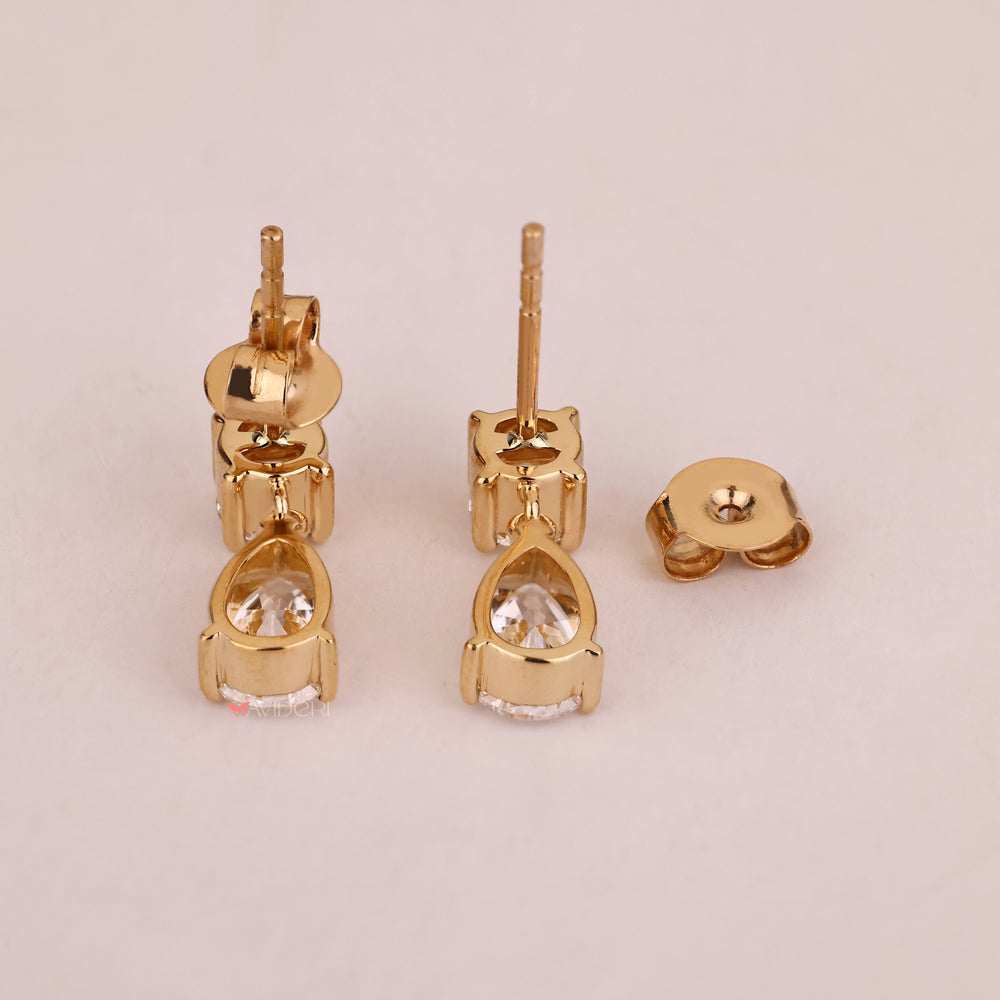 Yellow gold earrings in handmade jewelry.