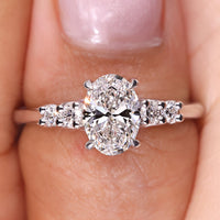 Oval Diamond Engagement Ring With Leaf Accent