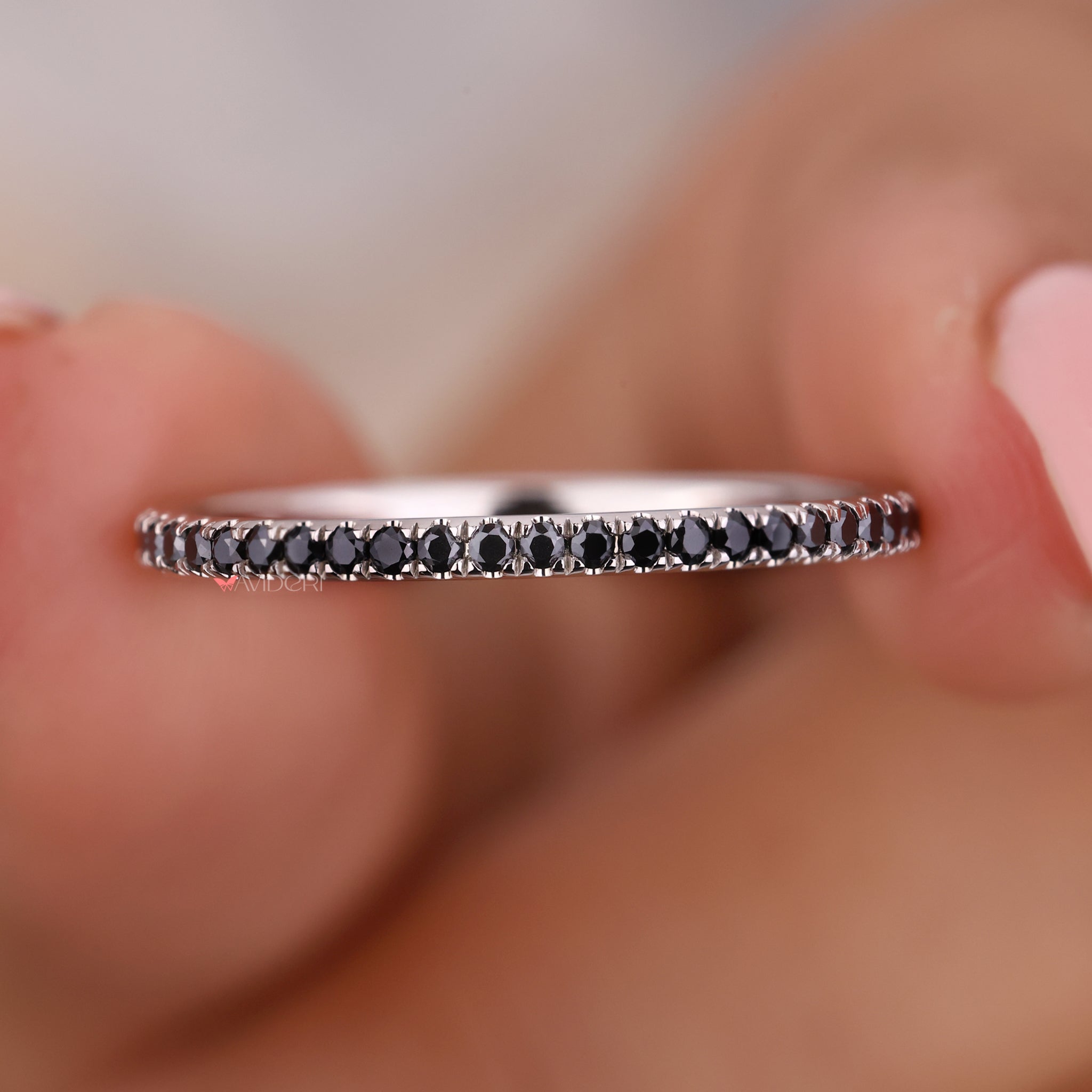 Gold eternity band featuring a round cut eternity band for luxury.