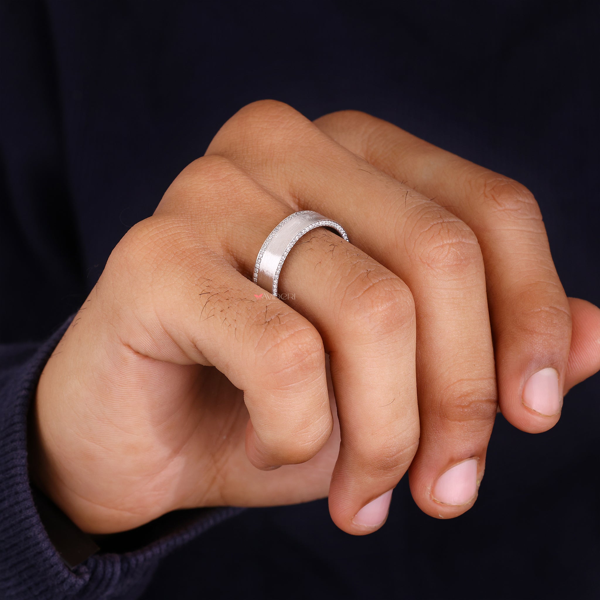Mens pave diamond ring combines clean lines with radiant accents.
