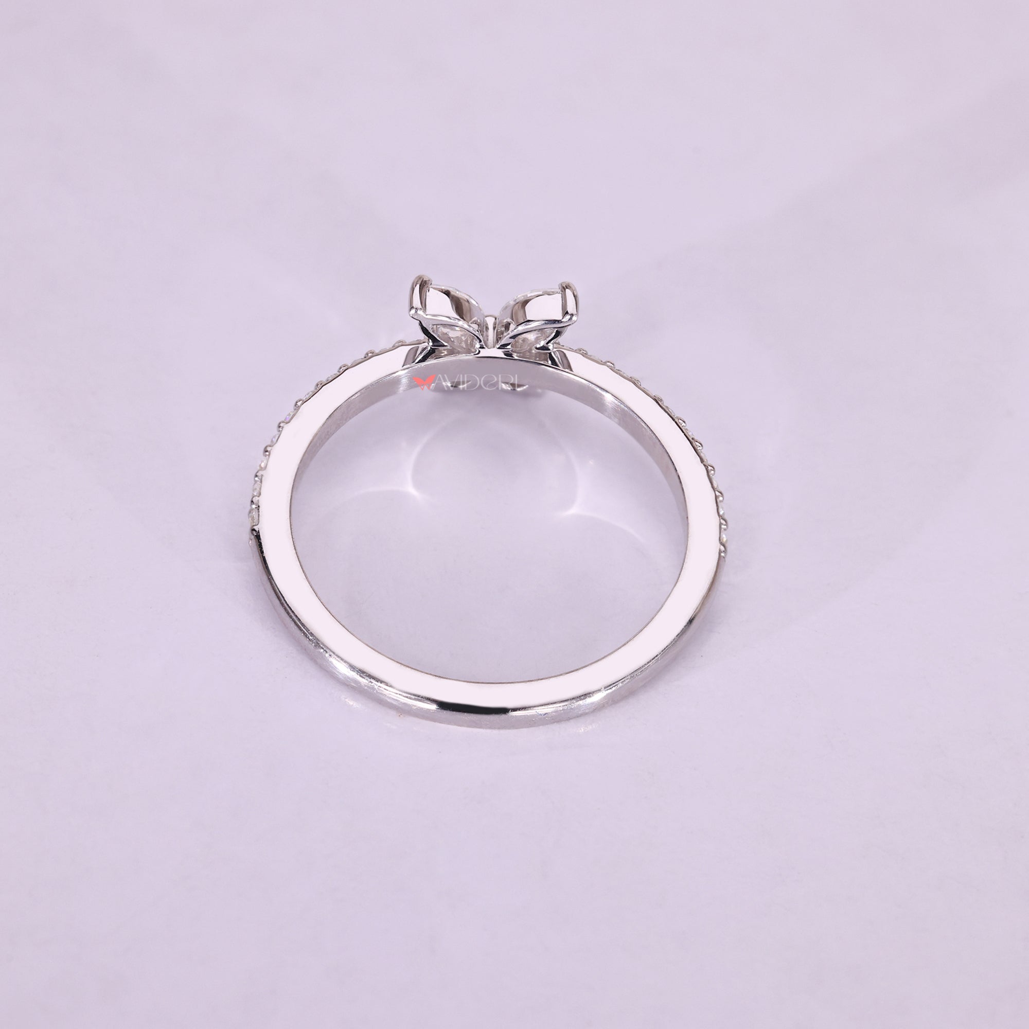 Marquise moissanite ring in a moissanite wedding band
