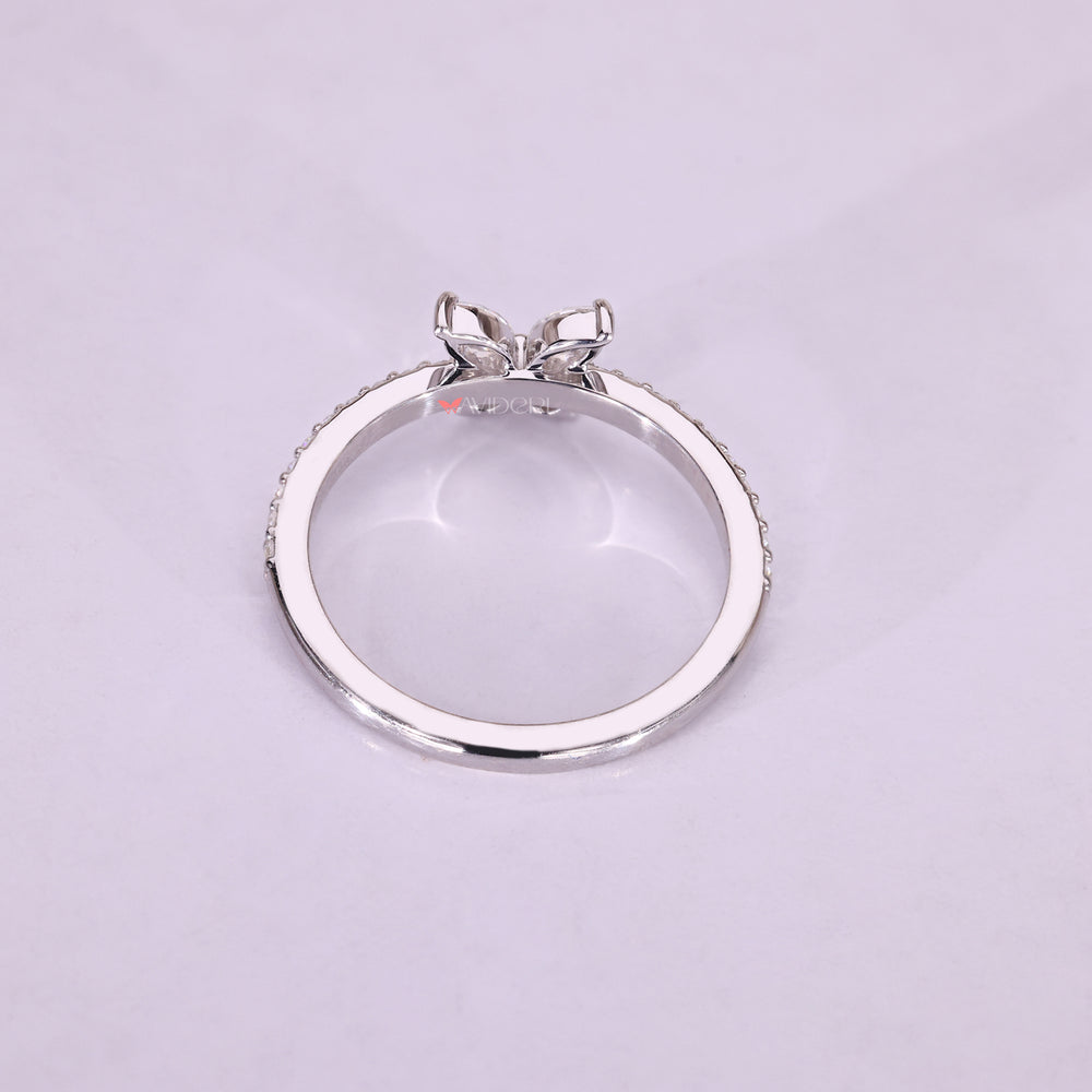 Marquise moissanite ring in a moissanite wedding band
