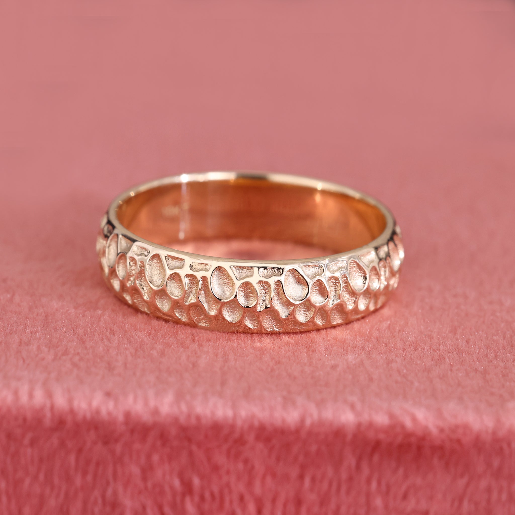 Simple gold mens wedding band adds subtle charm with classic appeal.
