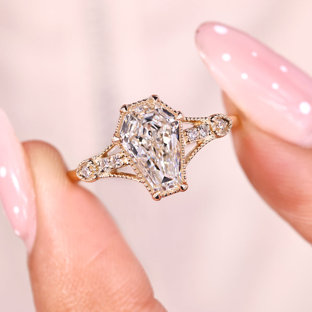 Custom coffin cut diamond engagement ring with milgrain band.