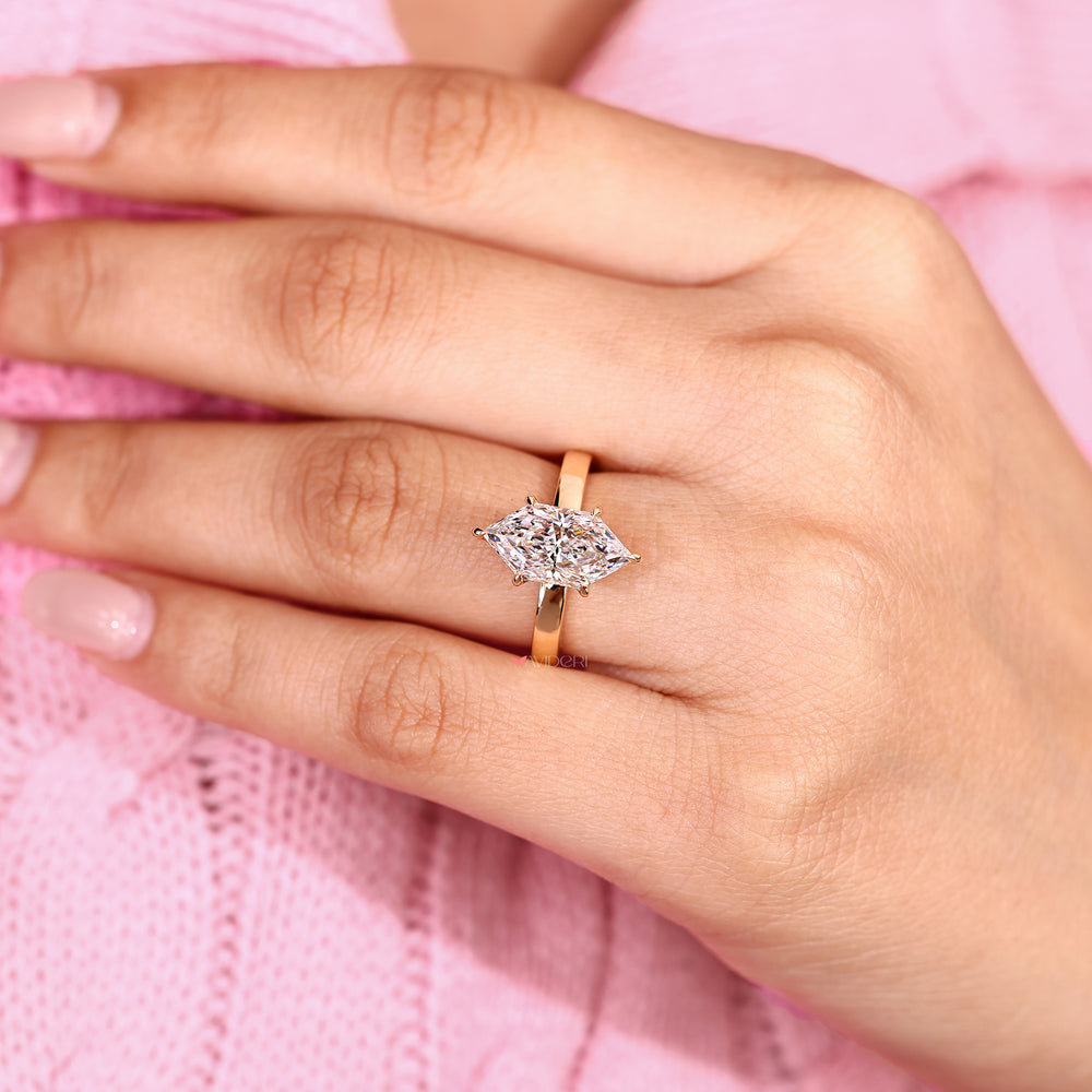Lab grown Dutch marquise ring with six claw prongs.