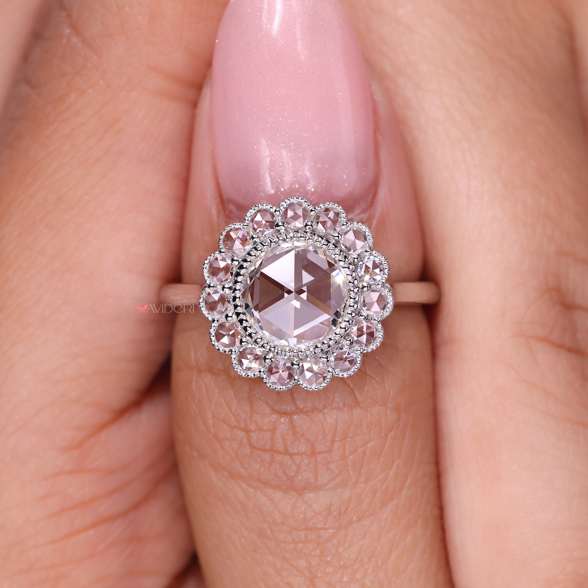 Lab Grown Diamond Ring with a round rose cut diamond set in a white gold band.