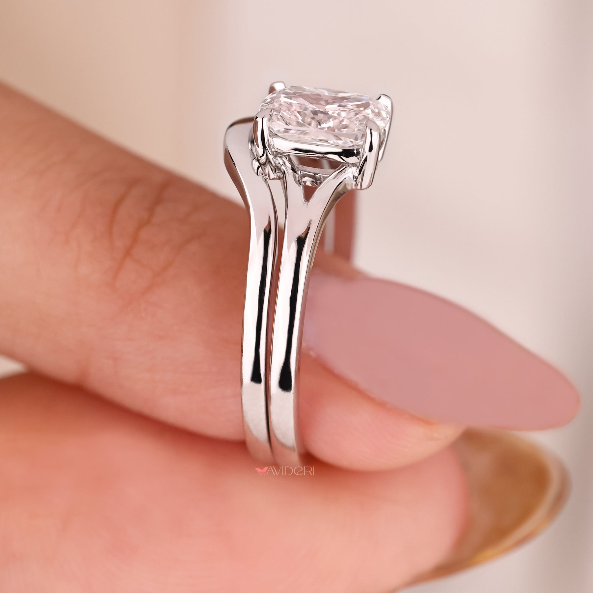 White gold bridal sets featuring a cushion cut ring with classic wedding band.