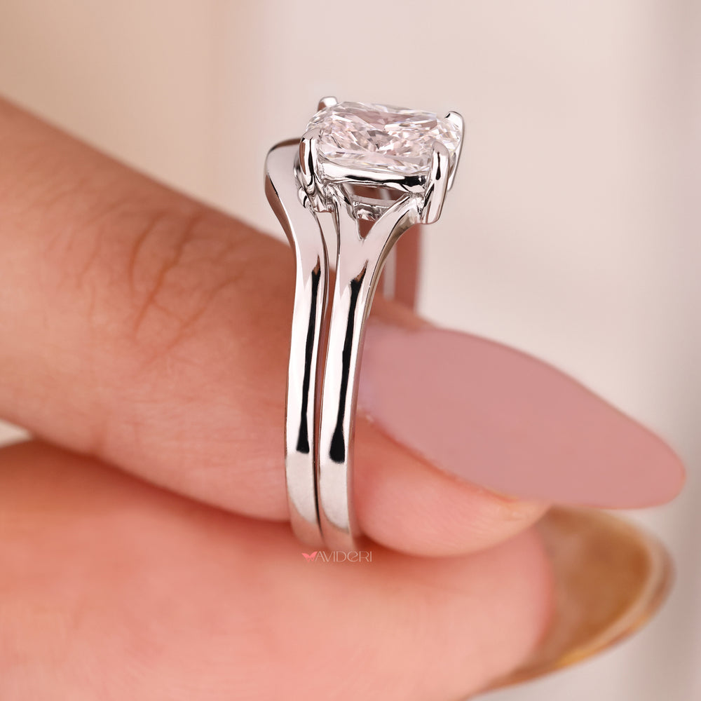 White gold bridal sets featuring a cushion cut ring with classic wedding band.