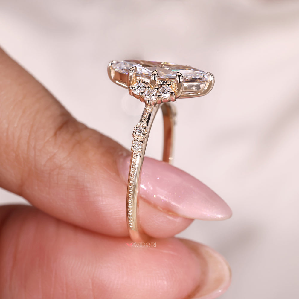 Yellow Gold Ring with a marquise diamond, perfect for an elegant engagement.