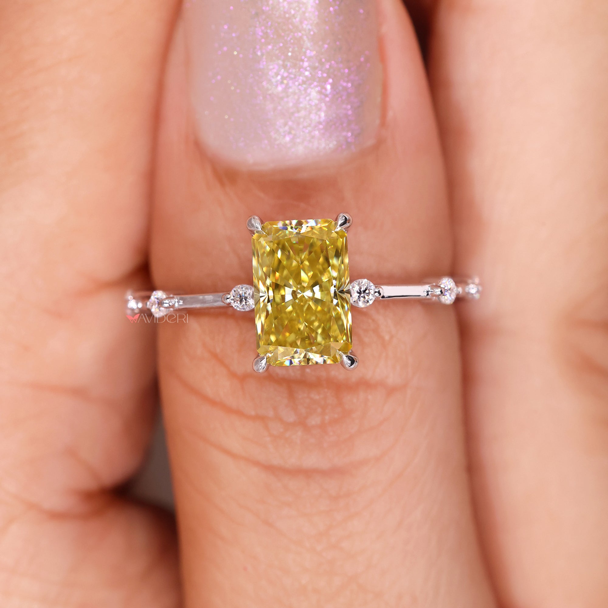 A 4 prong setting holds the center stone securely in place.