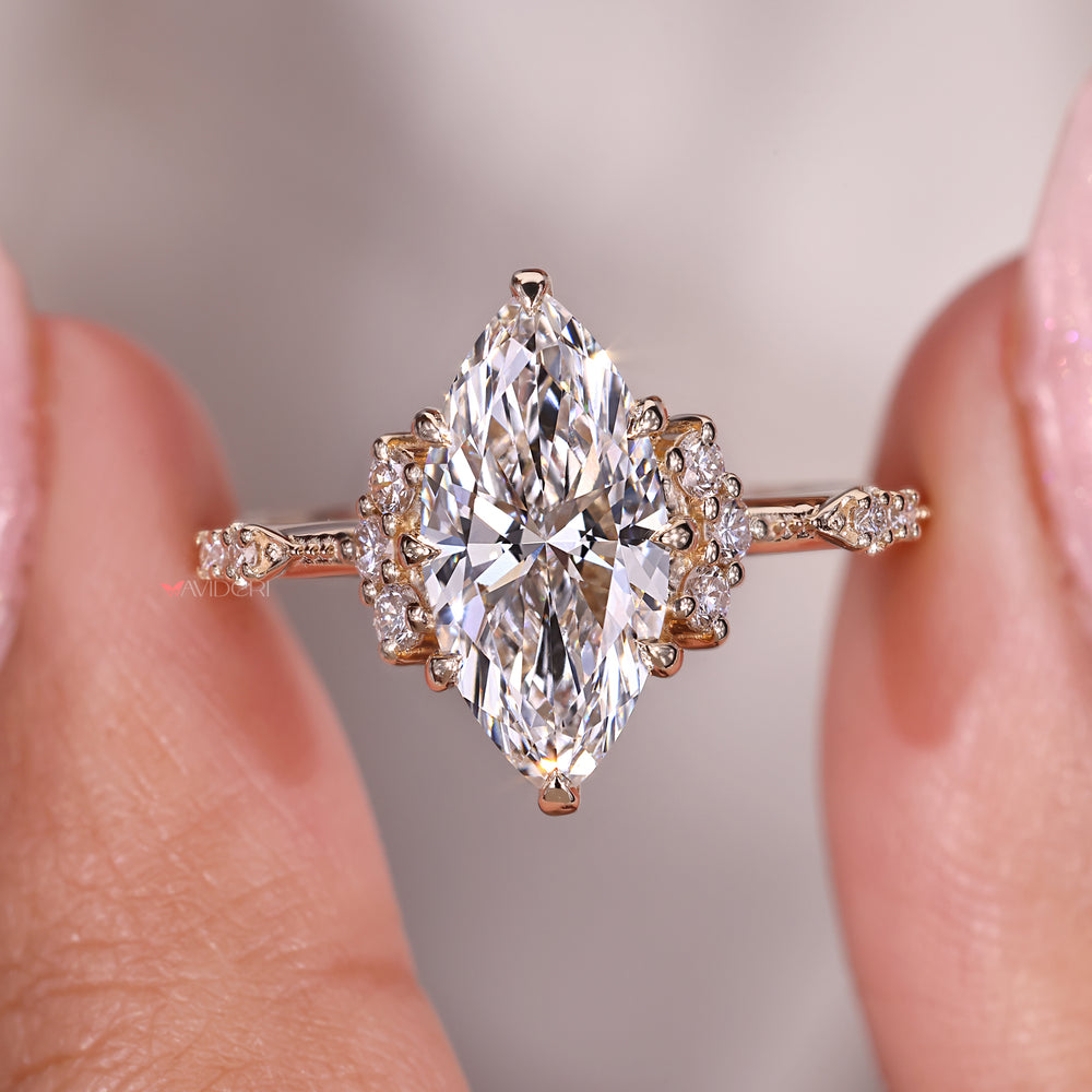 Muse Setting Ring with a marquise diamond, showcasing an artistic and contemporary style.