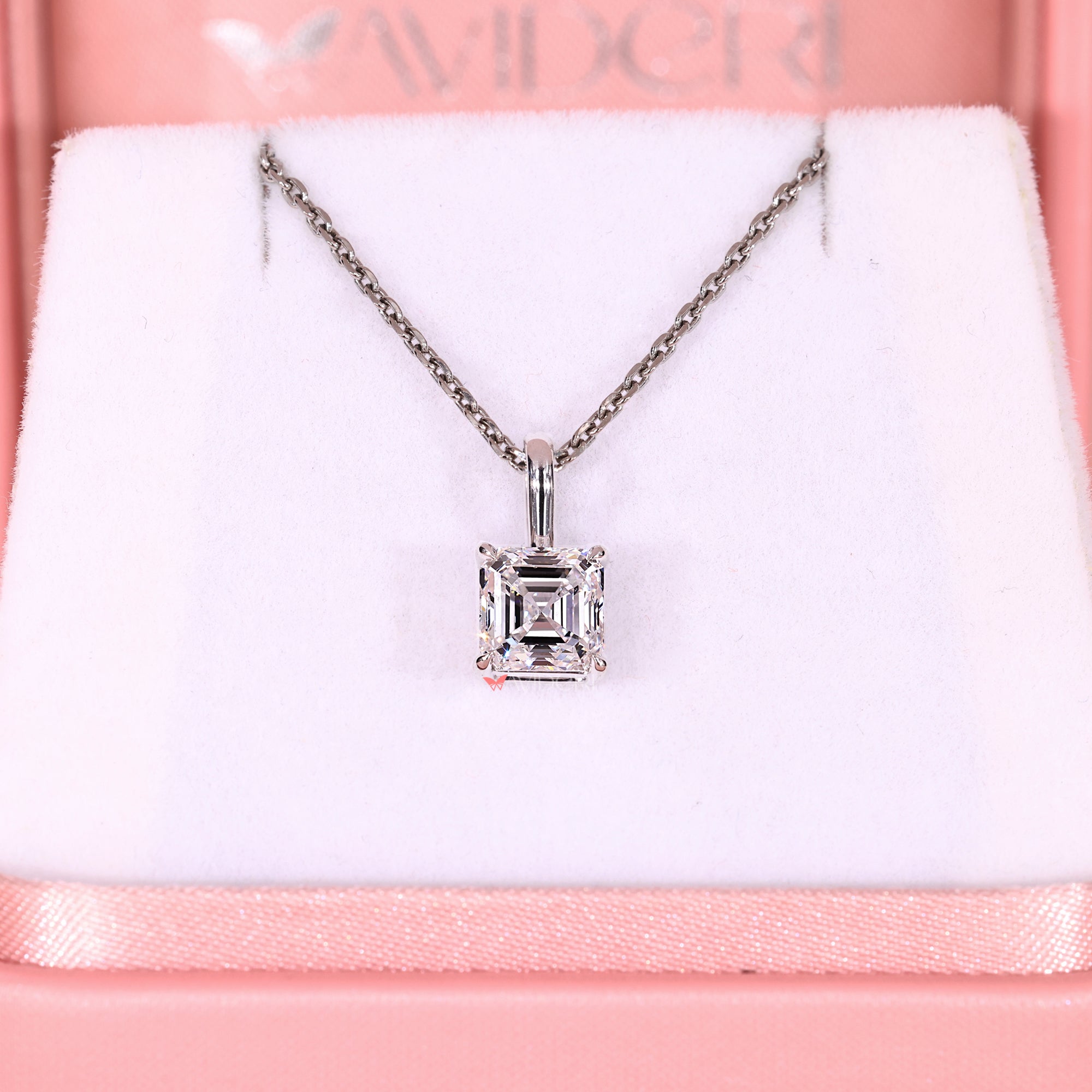 Handmade pendant with Asscher cut diamond pendant.