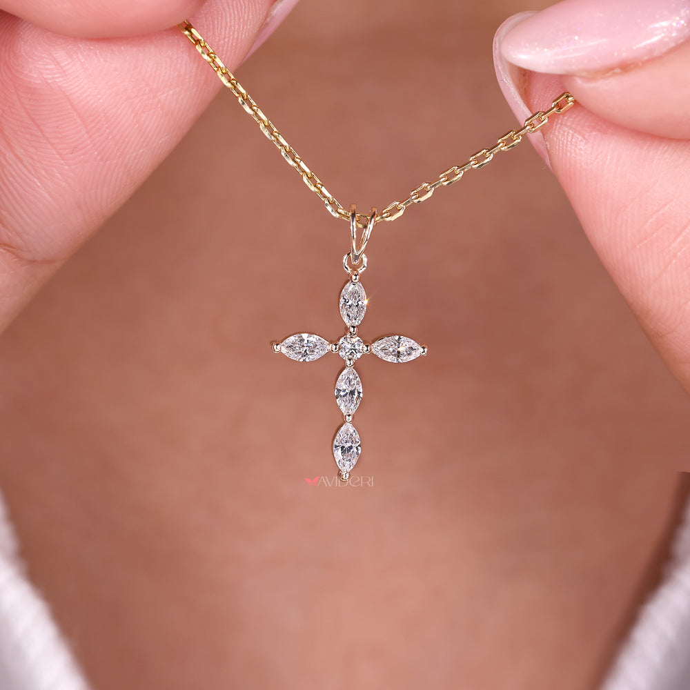 Round marquise diamond cross pendant design.
