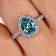 Pear cut ring in white gold with a beautiful halo setting.