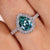 Pear cut ring in white gold with a beautiful halo setting.
