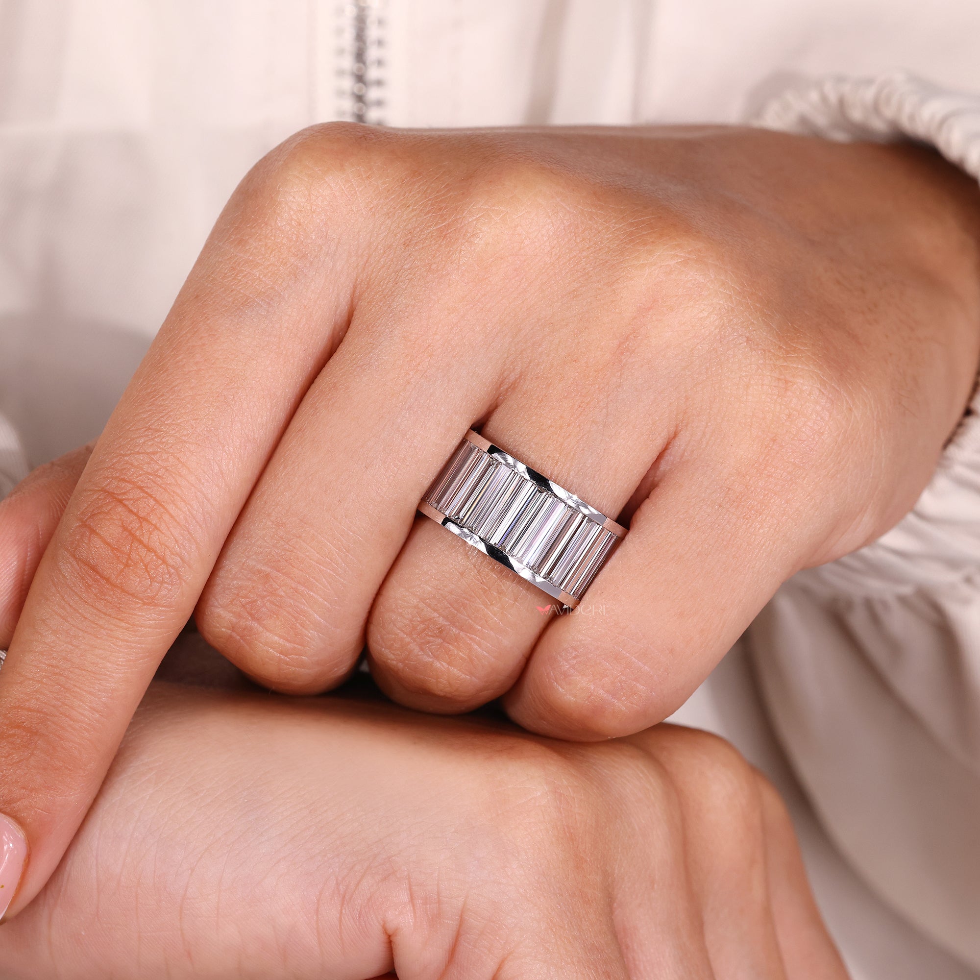 White gold diamond wedding band with channel setting.
