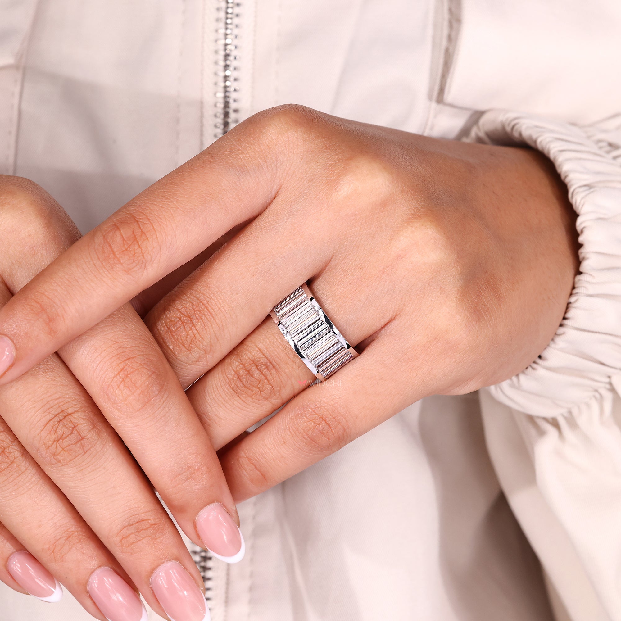 Handmade band with precise channel set diamonds.
