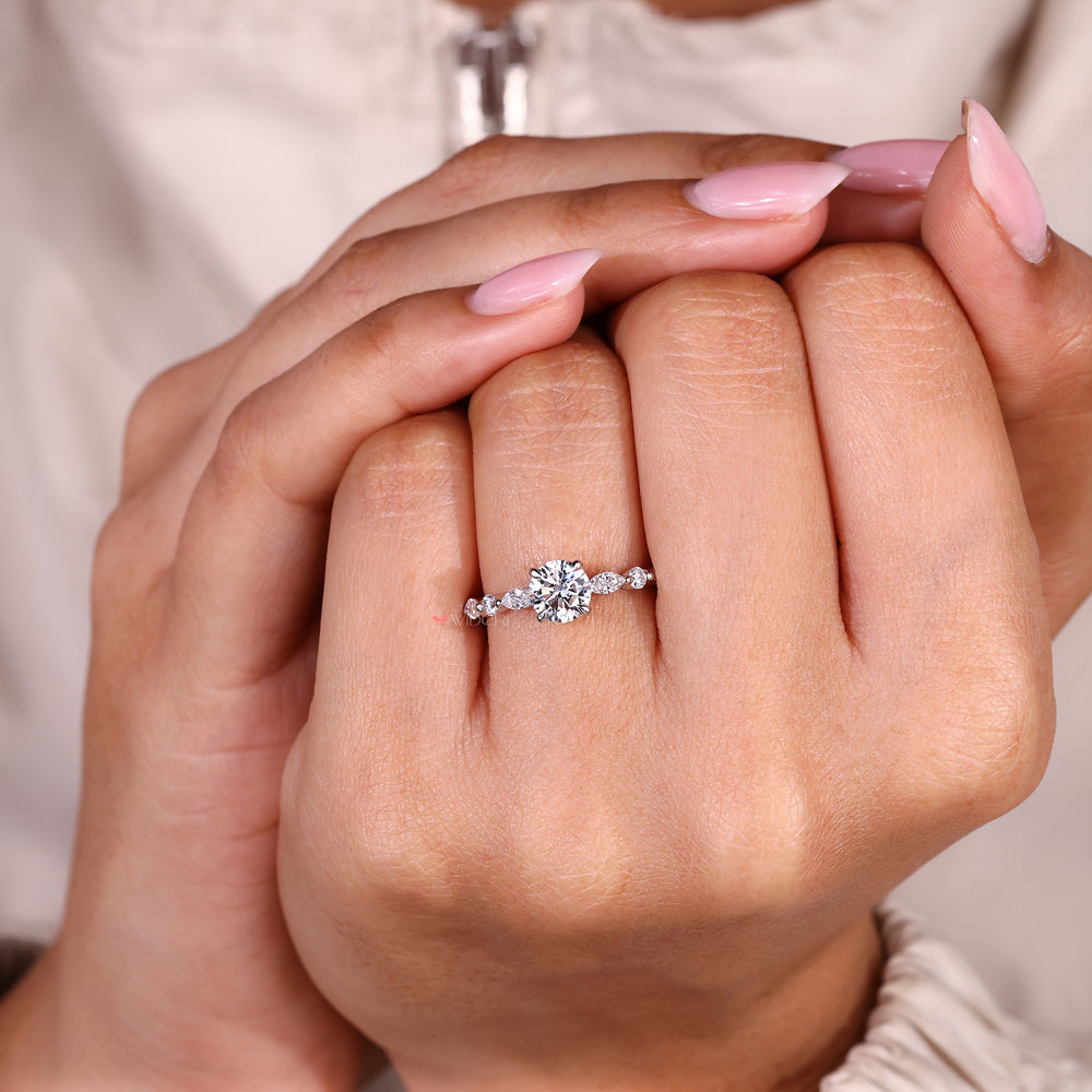 Four claw prong round diamond engagement ring handmade.