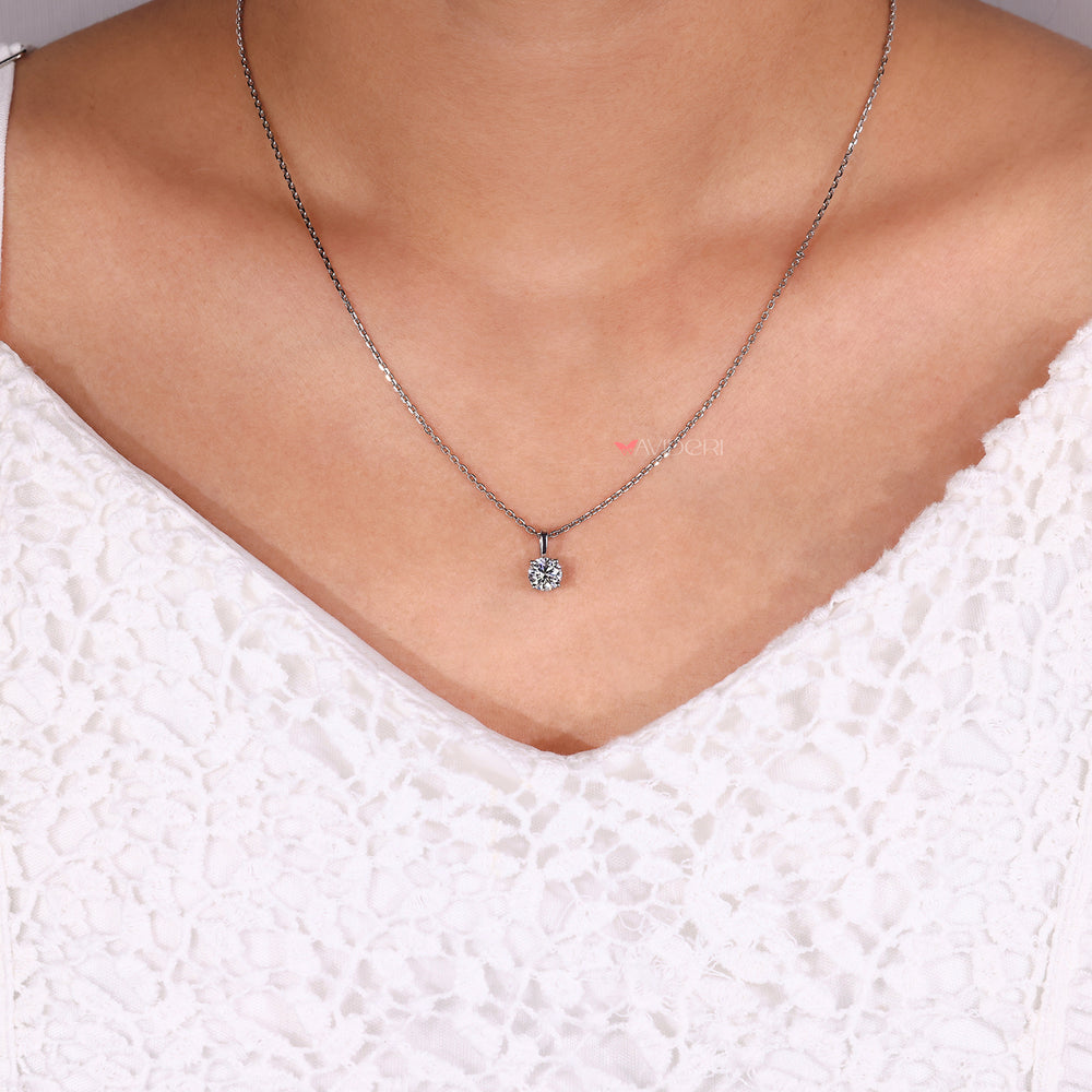 Minimal moissanite pendant for daily wear.