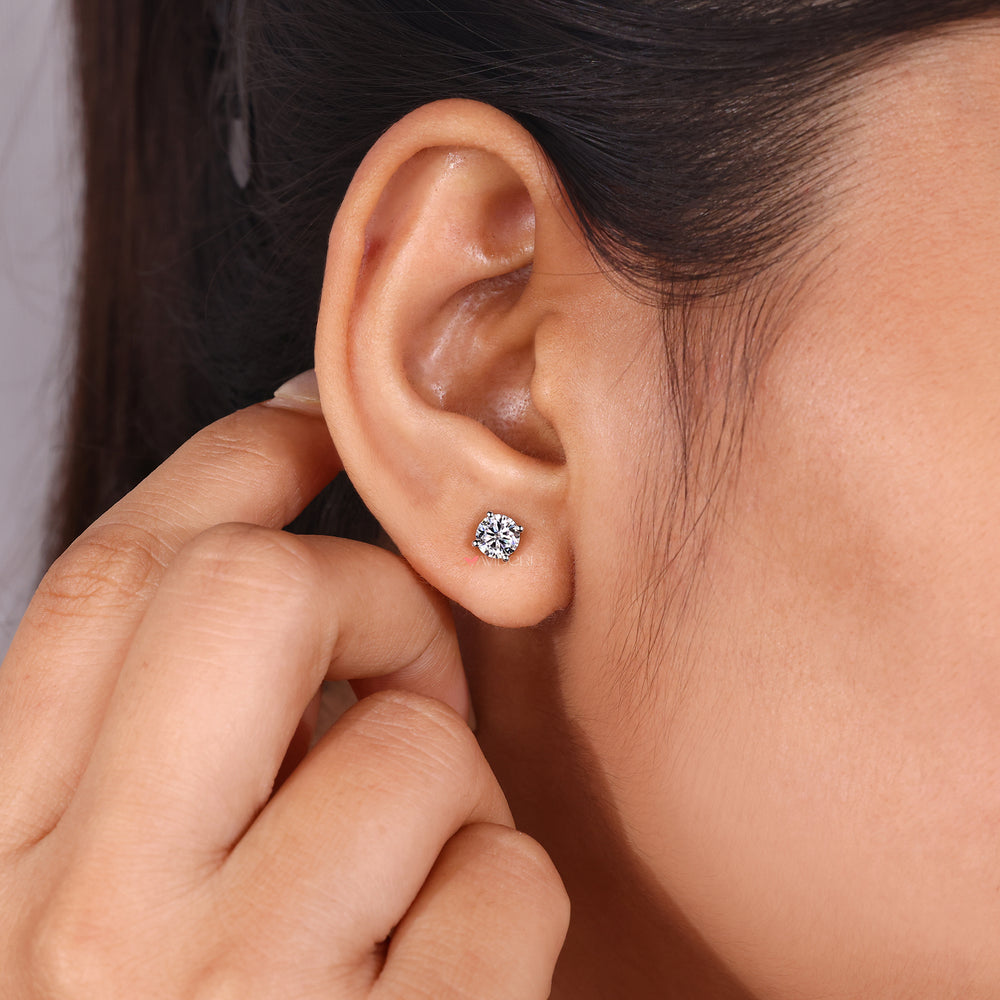 Lightweight moissanite studs for daily wear.