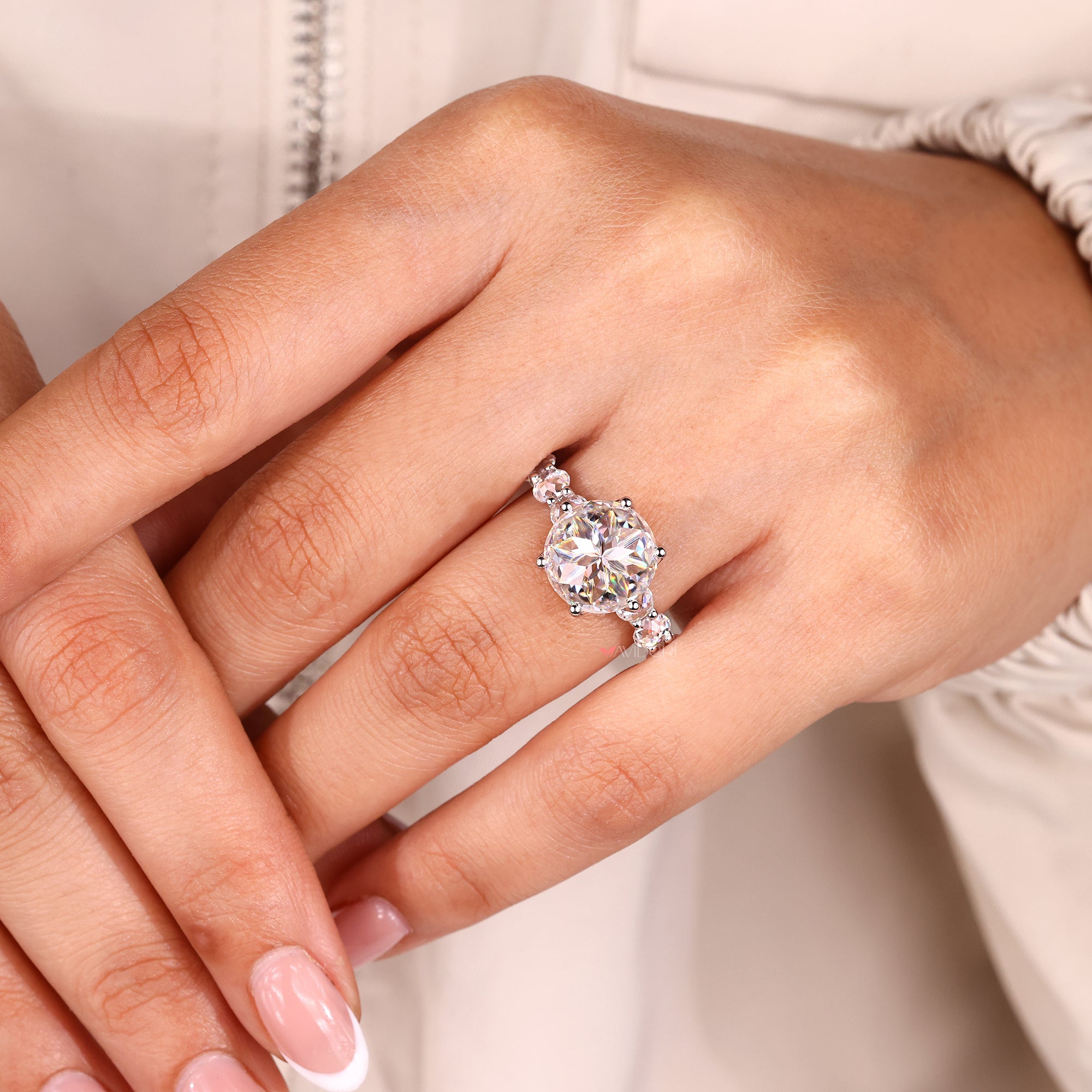 Moissanite engagement ring with round rose cut stone.