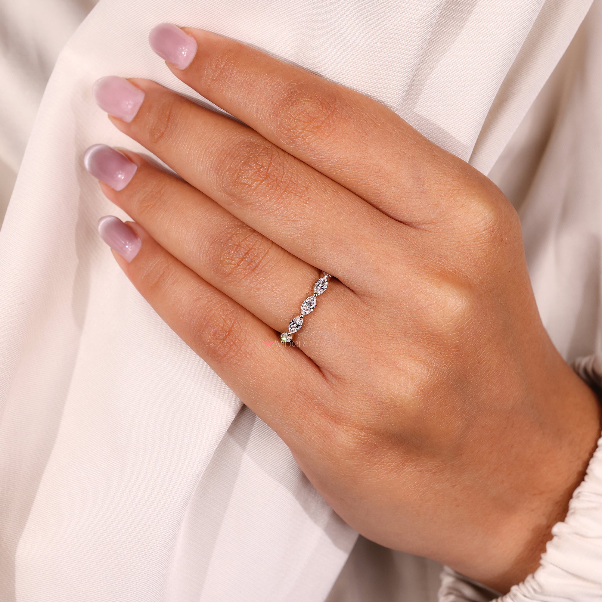Lab-grown diamond full eternity wedding band with shared prong setting.