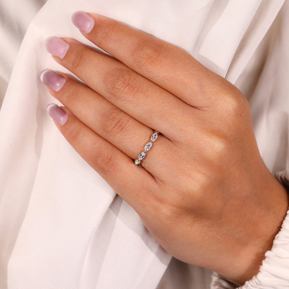 Lab-grown diamond full eternity wedding band with shared prong setting.
