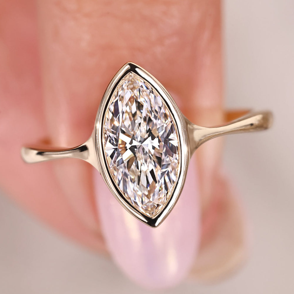 Marquise engagement ring with a bold center shape.