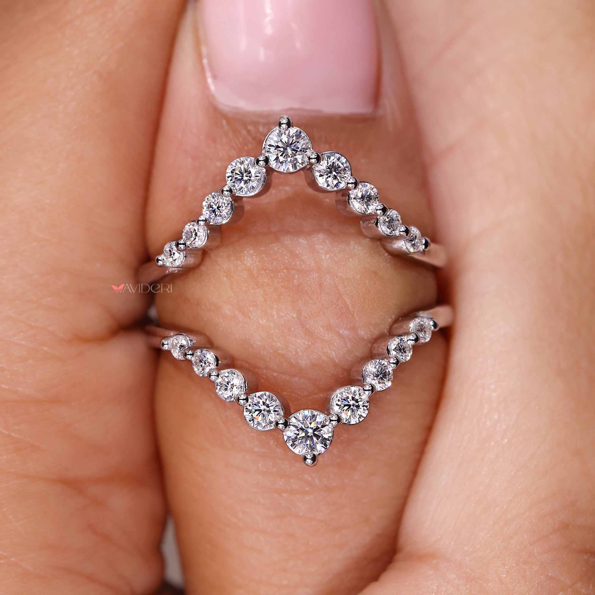 Shared Prong Band featuring stunning moissanite stones in a secure setting.