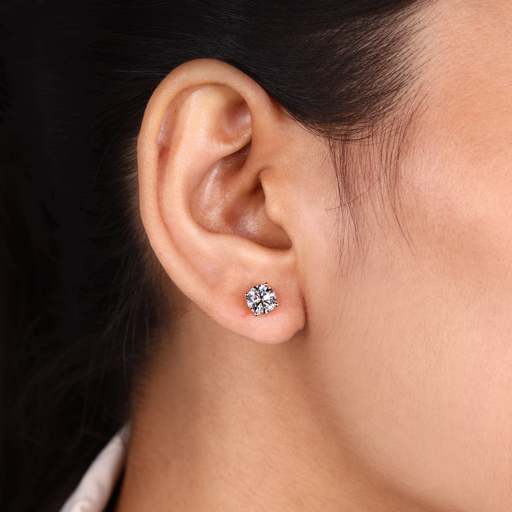 Simple diamond stud earrings crafted by Avideri.
