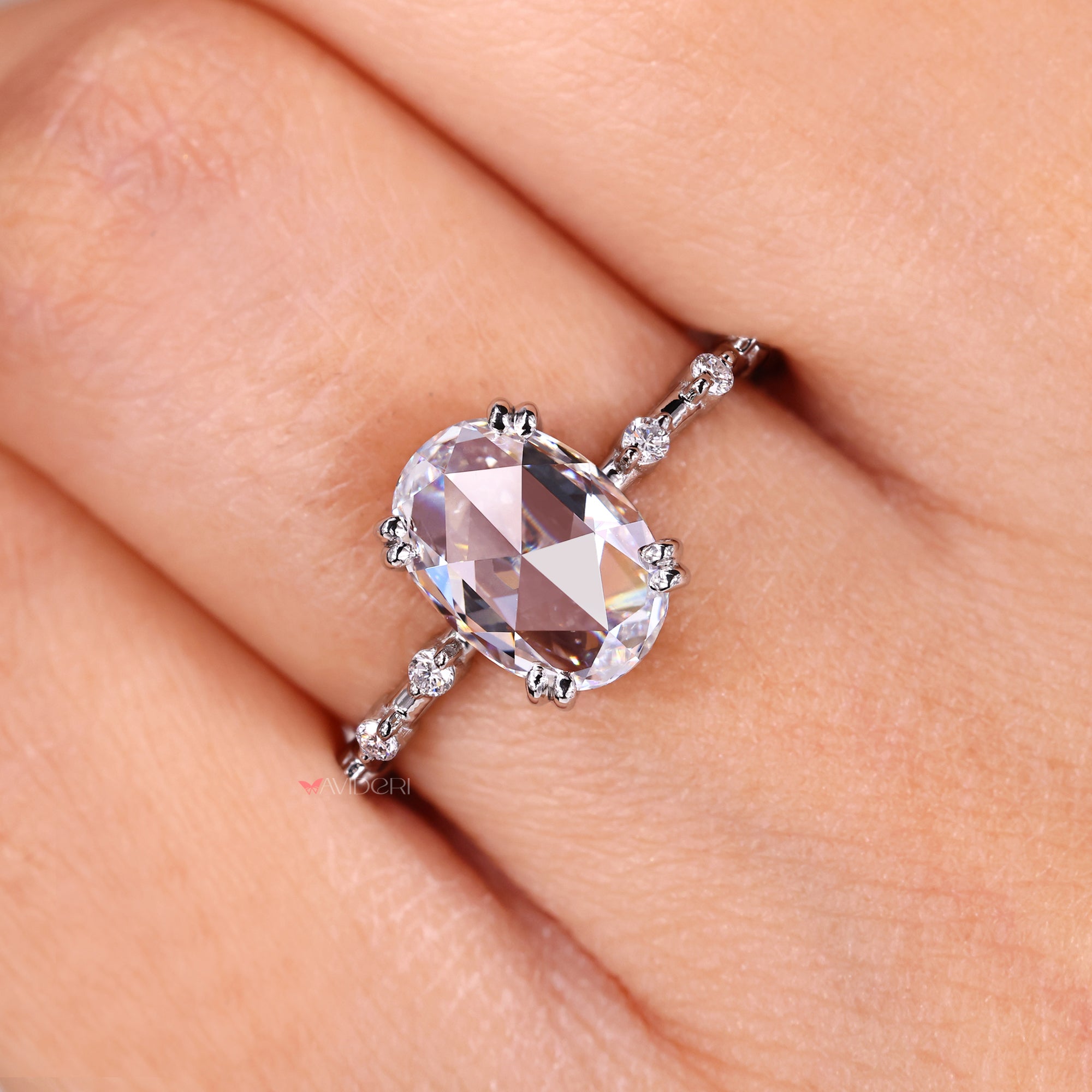 Handmade ring with oval rose cut engagement ring.