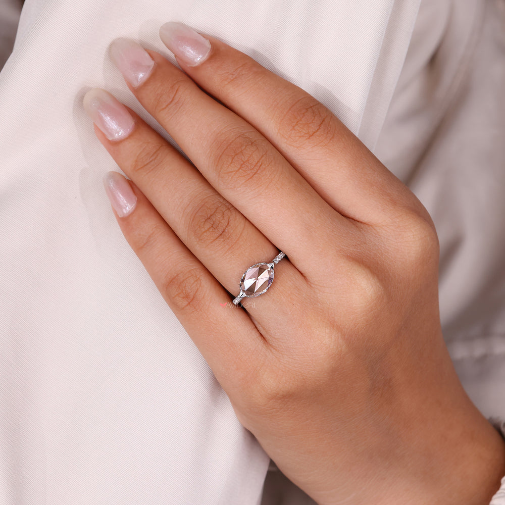 Avideri engagement ring showcasing east west oval diamond.