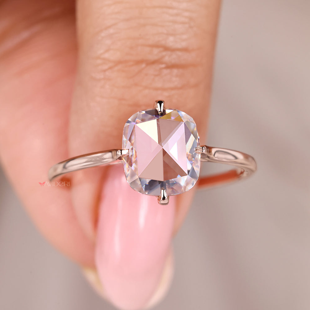 Rose gold ring with a cushion cut moissanite, perfect for proposals or gifts.
