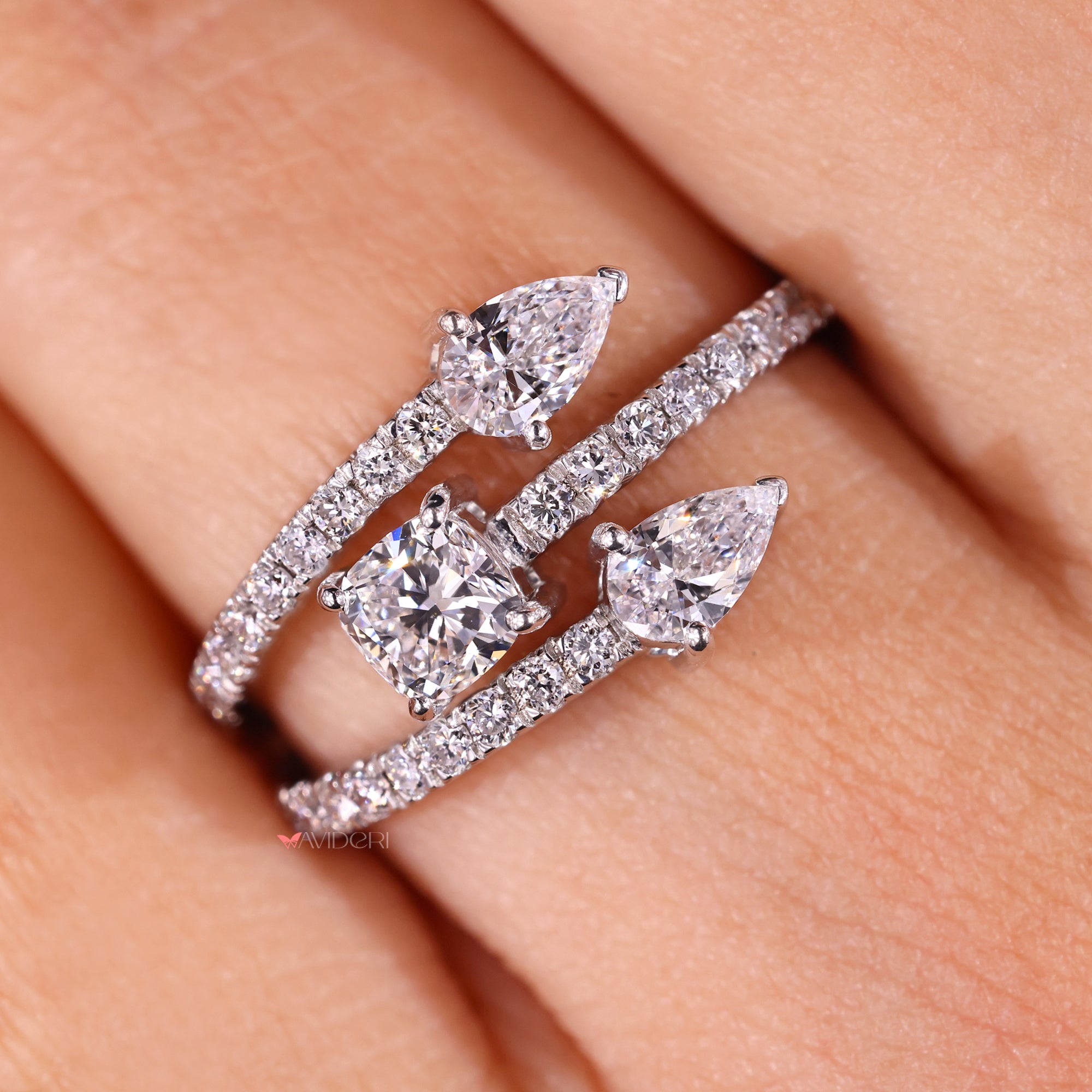 White gold engagement ring with pear diamond.
