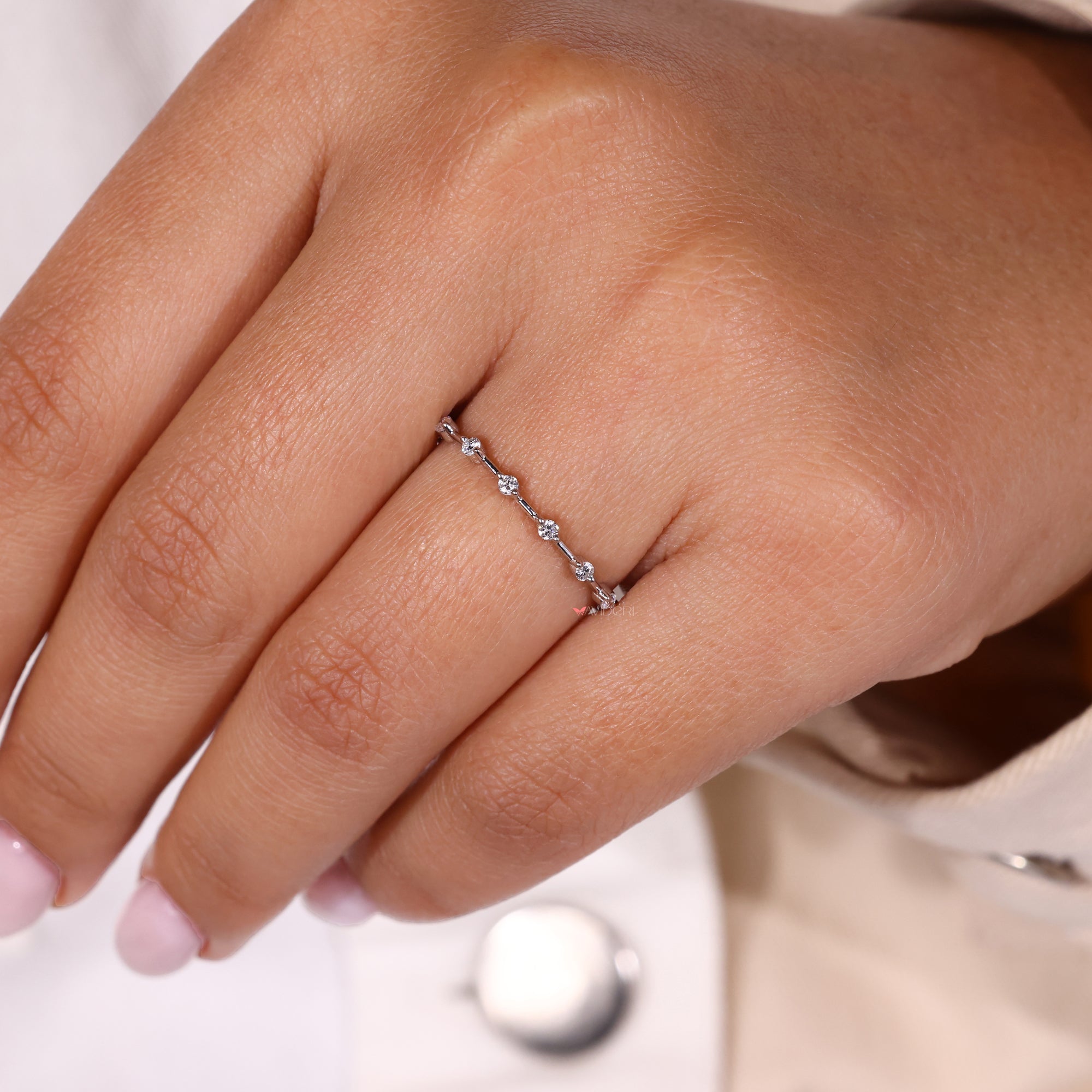 Avideri wedding band with white gold band.