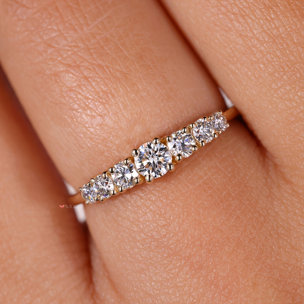 Handmade band with round diamonds for a timeless look
