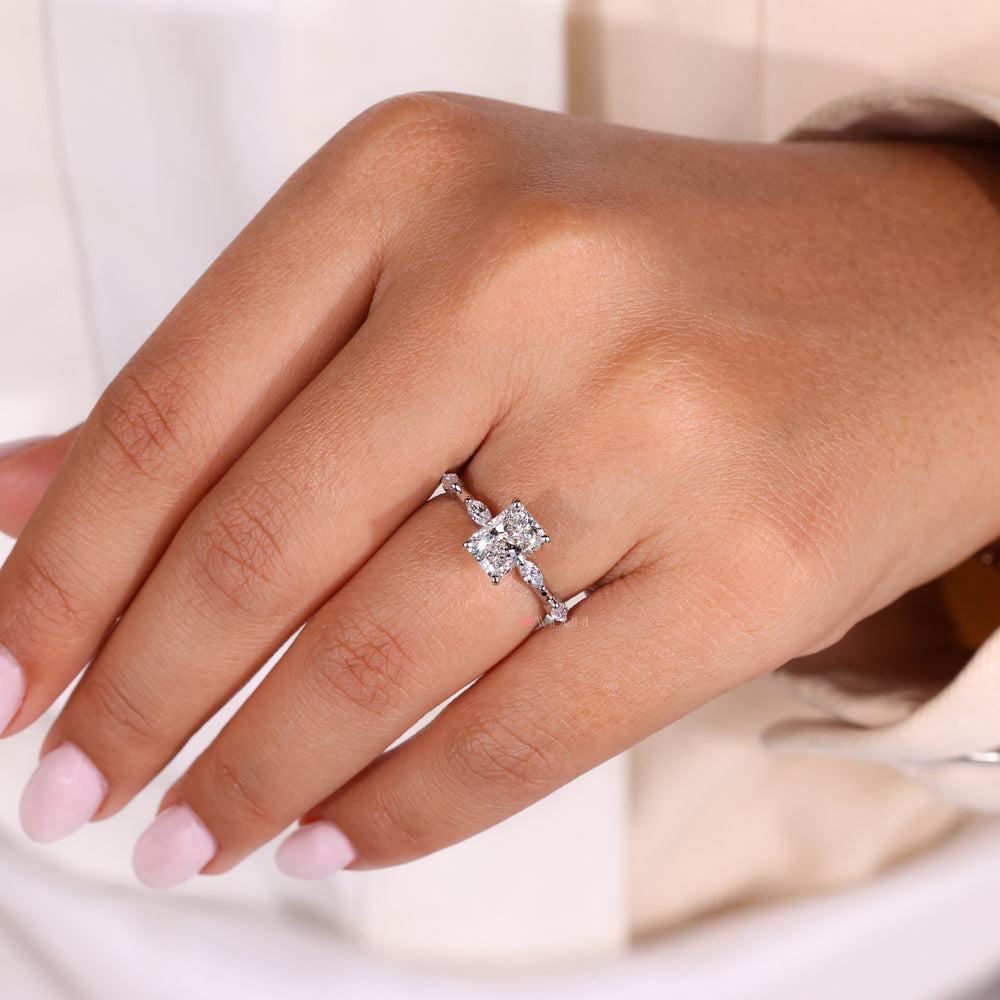IGI certified radiant engagement ring with a brilliant moissanite center.

