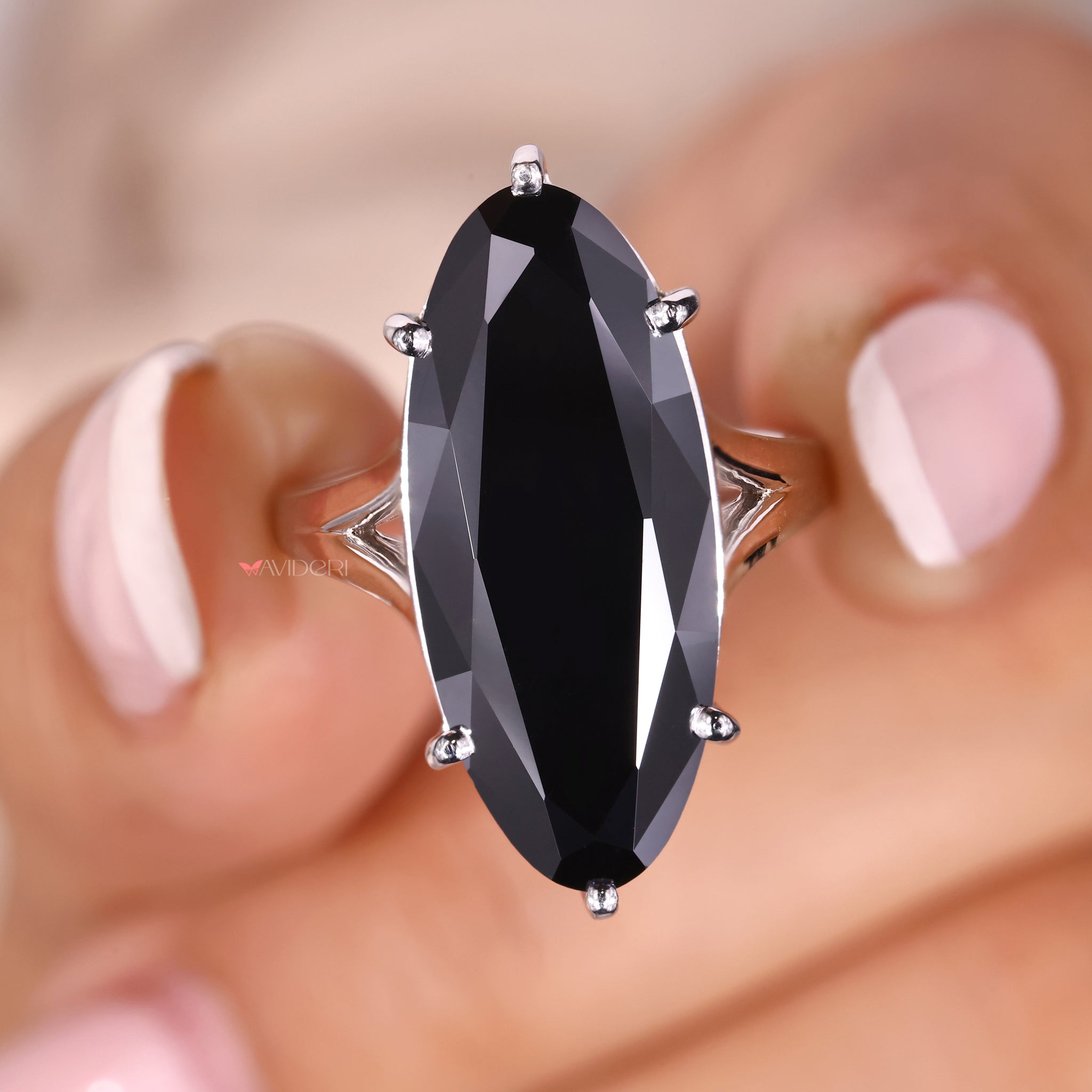 Handmade jewelry piece featuring custom moissanite design.