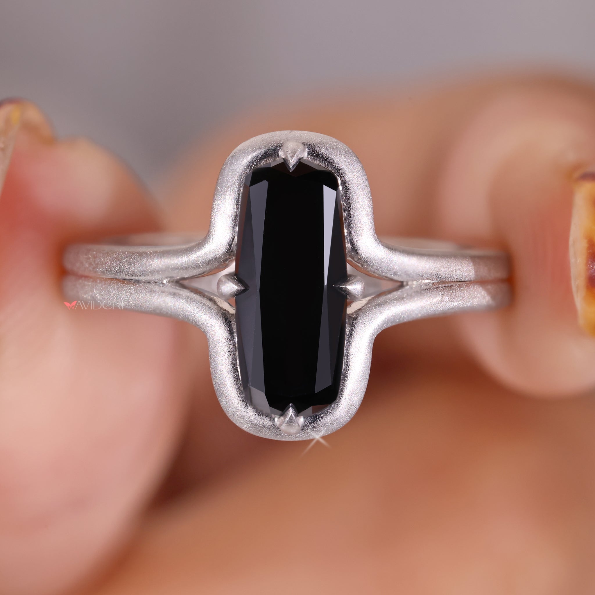 Modern matte finish ring set with a bold black stone
