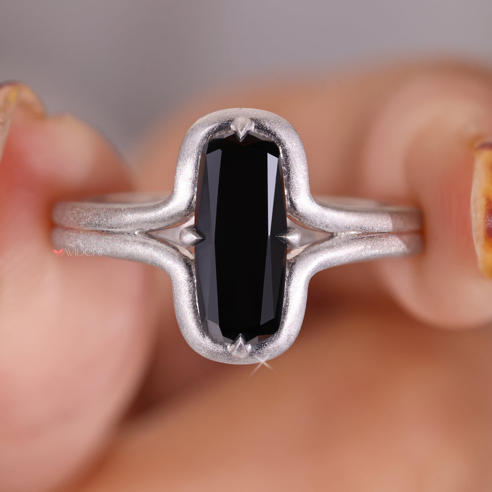 Modern matte finish ring set with a bold black stone
