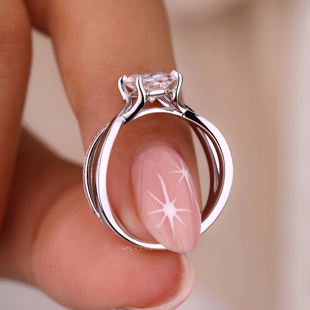 Sleek white gold ring with a stunning twisted design
