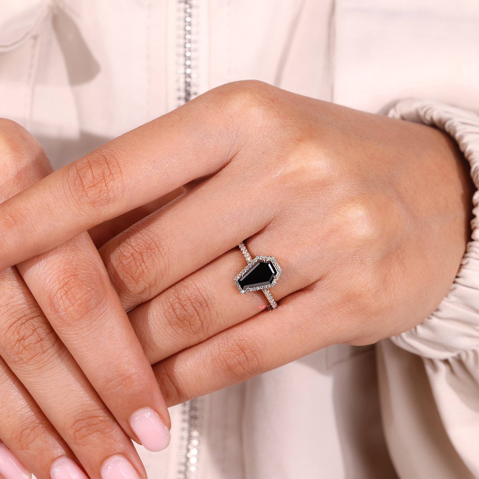 Avideri ring with coffin cut engagement ring.