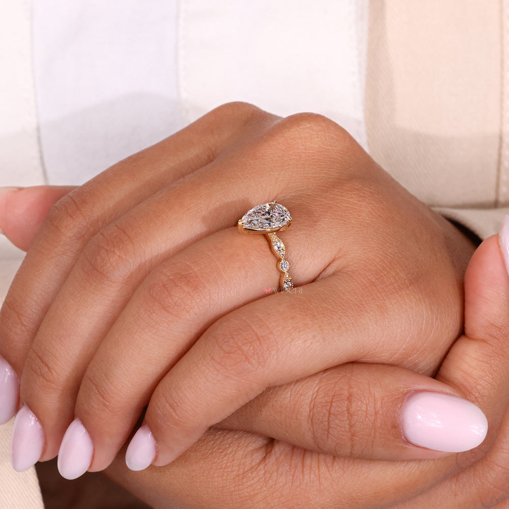 Round diamond engagement ring designed with classic elegance and charm.
