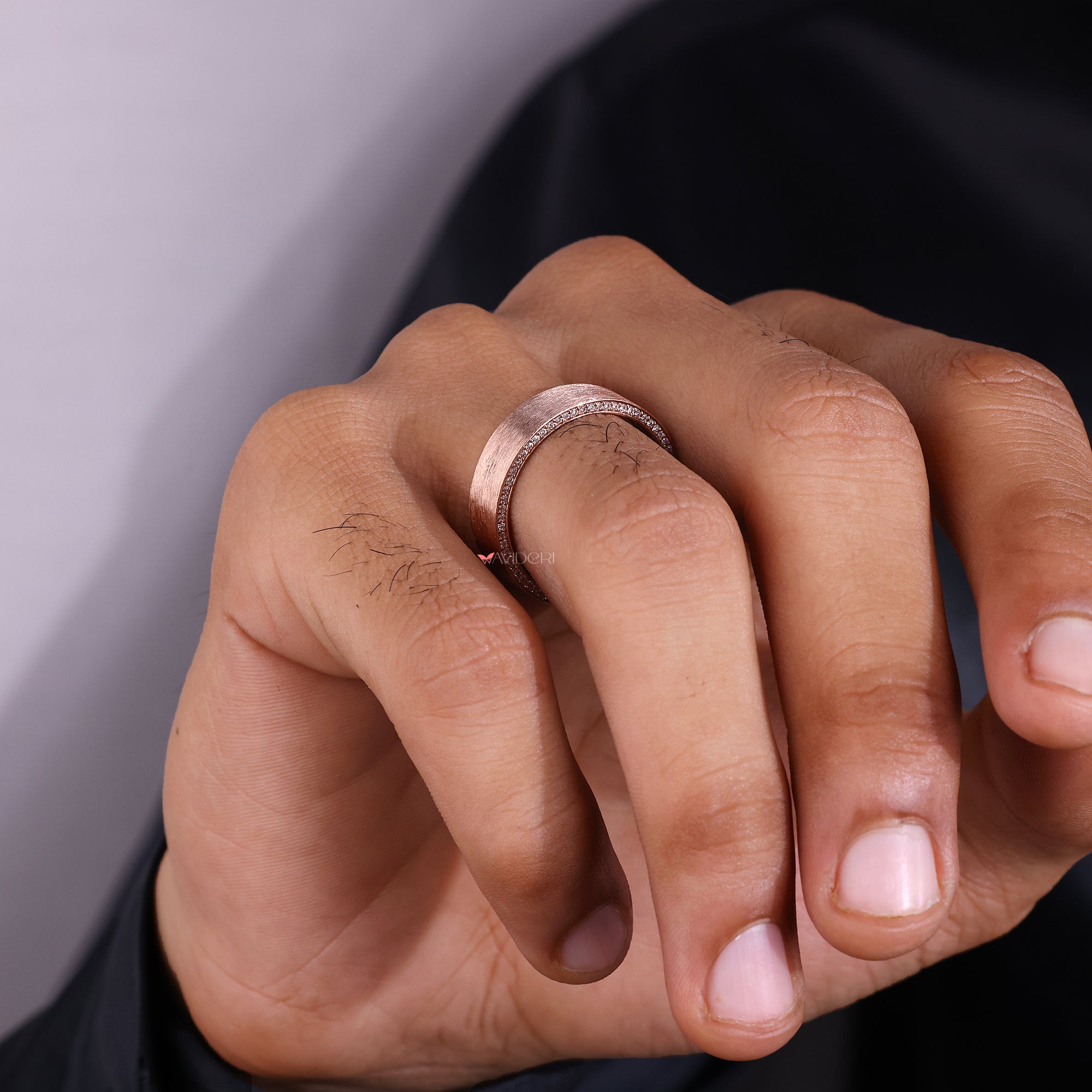 Avideri band with mens rose gold ring.