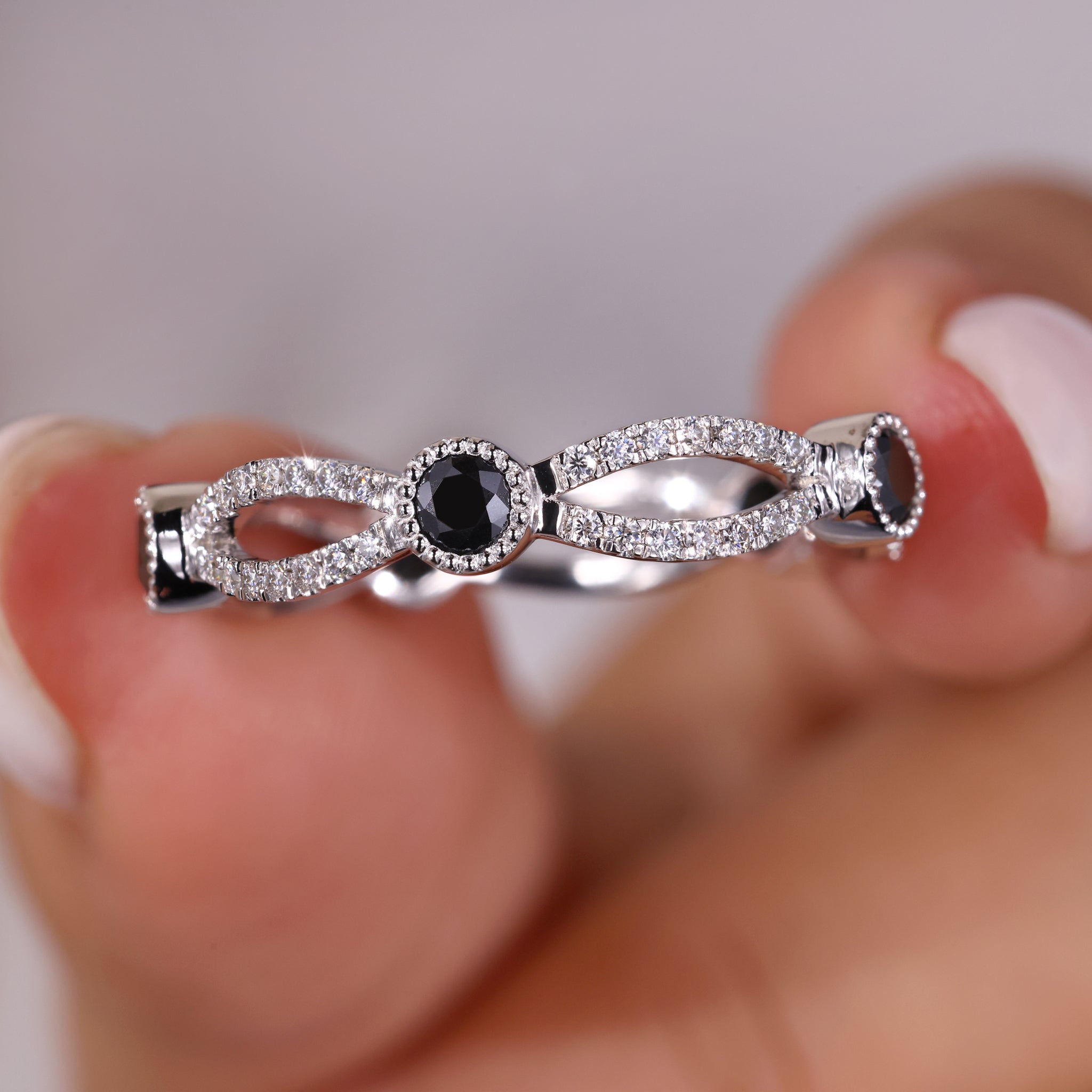 Infinity wedding band with a round cut wedding band design.